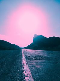 Scenic view of mountains against sky during sunset