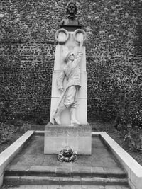 Close-up of statue against trees