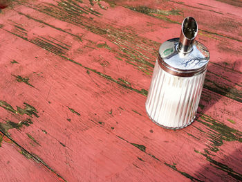 Close-up of red object on table