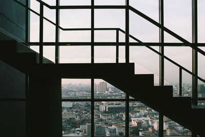 Buildings seen through glass window