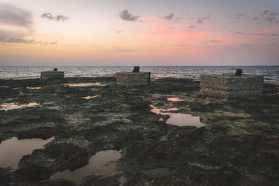 Scenic view of sea against sky during sunset