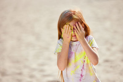 Side view of woman looking at beach