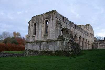 View of old ruin building against cloudy sky