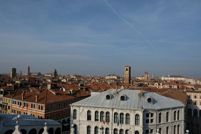 Buildings in city against sky
