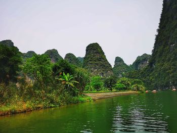 Scenic view of river against clear sky