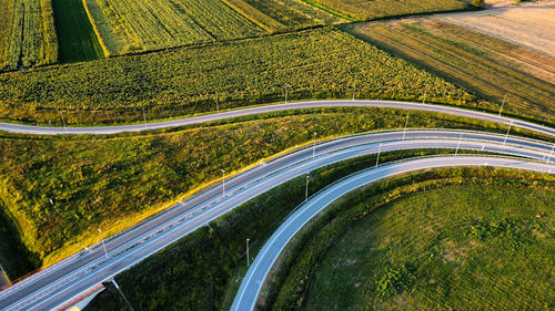 High angle view of road amidst field