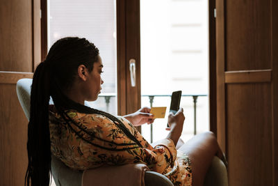 Man sitting on mobile phone