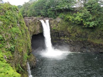 View of waterfall in forest