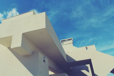 Low angle view of built structure against blue sky