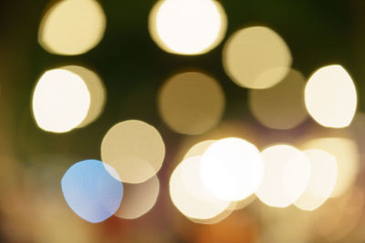 Defocused image of illuminated lights at night