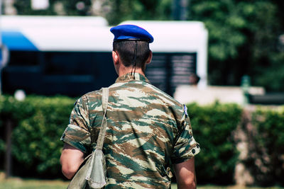 Rear view of man wearing mask