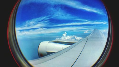 Cropped image of landscape against blue sky