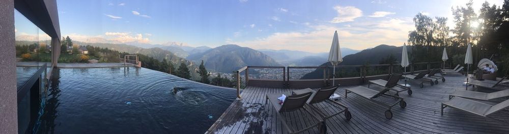 Panoramic view of swimming pool against sky