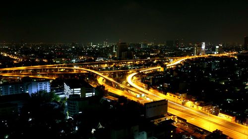 Illuminated cityscape at night