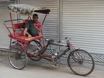 Man sitting on bicycle