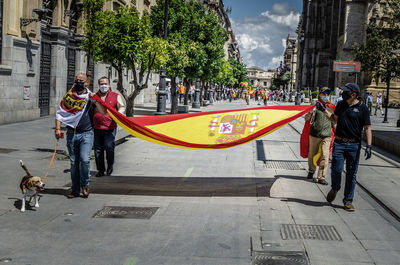 People on street in city