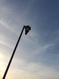 Low angle view of street light against sky