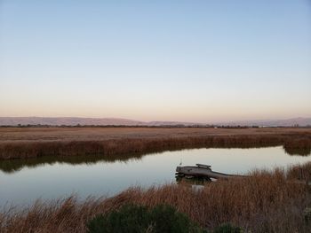 Scenic view of lake against clear sky