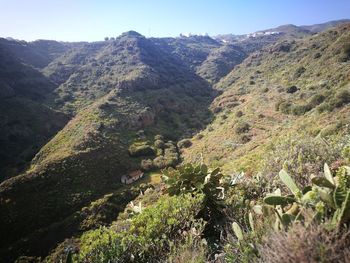 Scenic view of mountains against clear sky