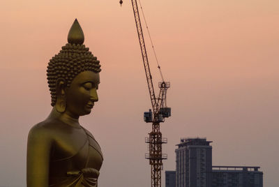 The giant golden buddha in wat paknam phasi charoen temple in phasi charoen district