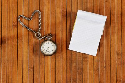 Close-up of clock on table