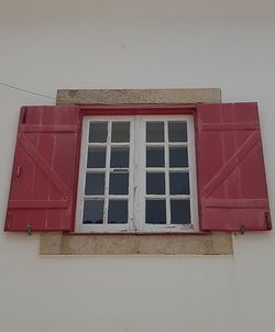 Low angle view of house window