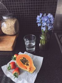 Close-up of flowers in bowl on table