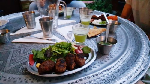 Close-up of food served on table