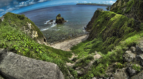 Scenic view of rock formation in sea