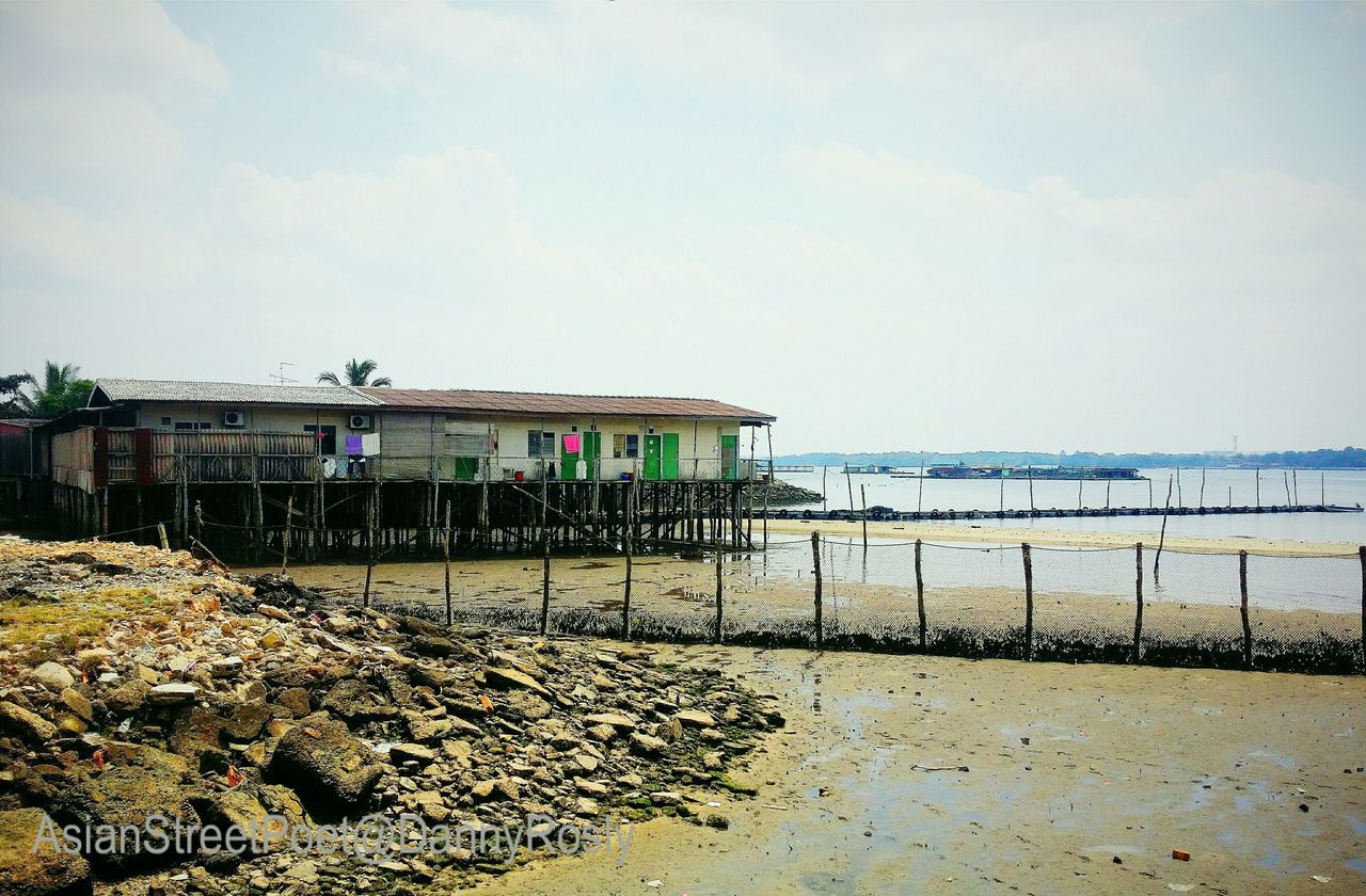 VIEW OF SEA AGAINST CLOUDY SKY