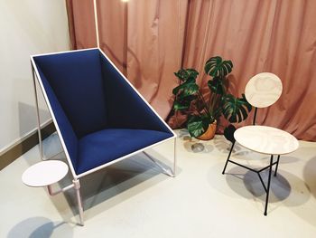 High angle view of empty chairs on table at home