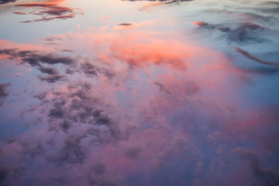 Low angle view of clouds in sky during sunset