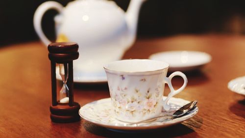 Close-up of coffee cup on table