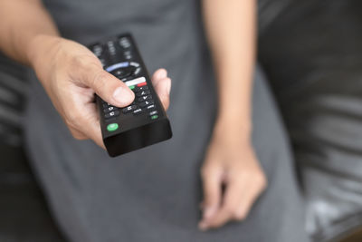 Close-up of man using mobile phone