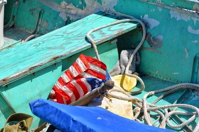 Close-up of moored fishing boat with american flag