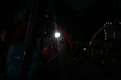Silhouette of woman at night