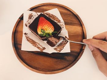 Close-up of hand holding food