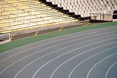 View of an empty stadium with blue running track