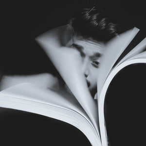 Portrait of a woman with open book