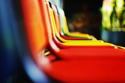 Close-up of empty seats in park