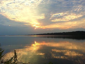 Scenic view of lake during sunset