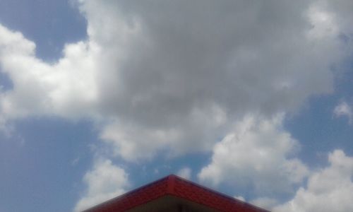 Low angle view of roof against sky