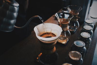 High angle view of coffee cups on table