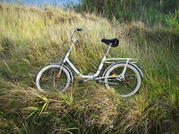 Bicycle parked on field