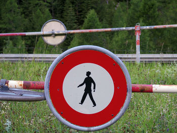 Scenic view of road amidst mountains hiking area icon signage