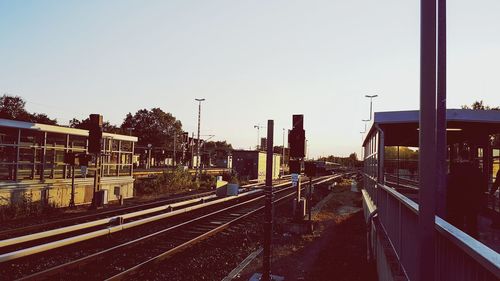 Train on railway tracks against clear sky