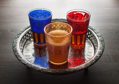 High angle view of drink in glass on table