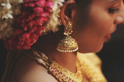 Close-up portrait of woman with flowers