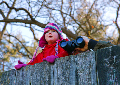 Portrait of cute girl in park during winter