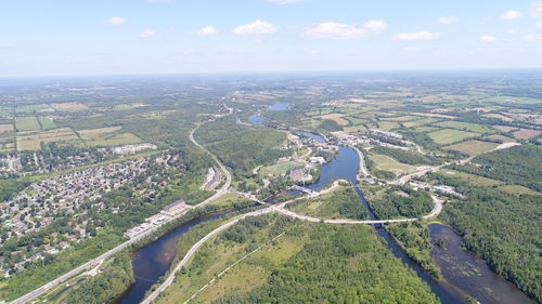 Aerial view of agricultural field against sky